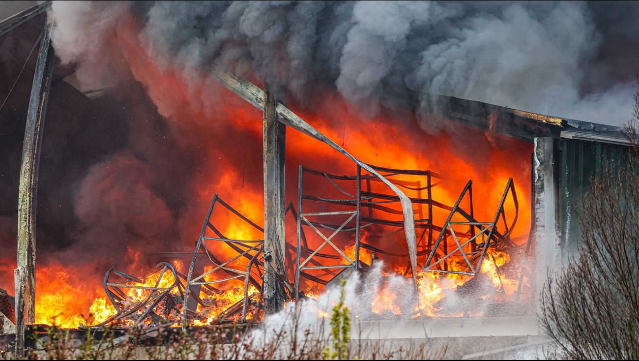 Massive Fire Engulfs De Groene Agri Warehouse in Rutten; Drone and Extinguishing Robot Deployed to Fight Flames